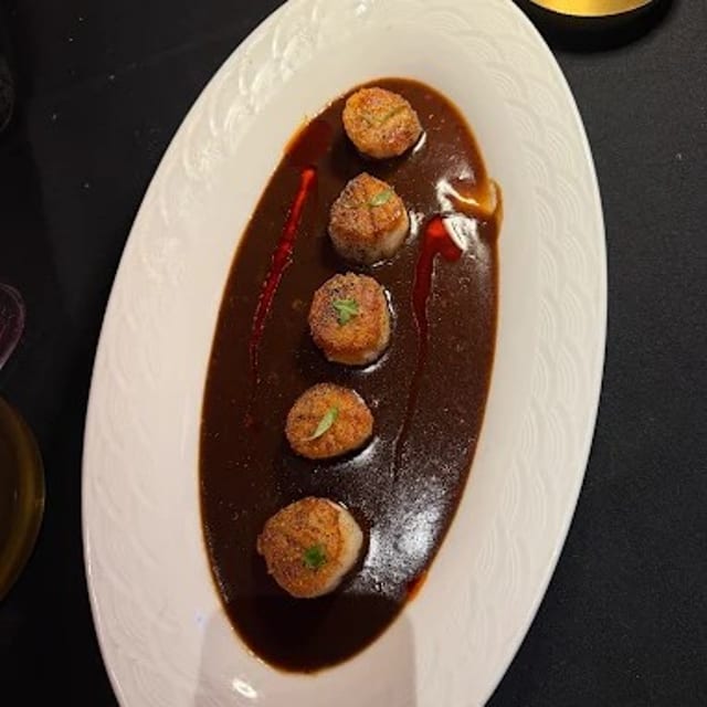 Grilled Scallops with Black Pepper Sauce.